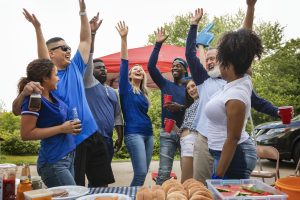 Team supporters celebrating company picnic